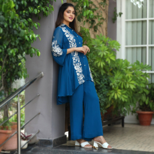 Royal Blue georgette tunic with thread embroidery detailing paired with georgette bell bottoms