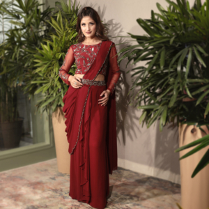 Blouse with F & Back hand embroidery, with a draped skirt, a draped georgette sash dupatta with border emb.