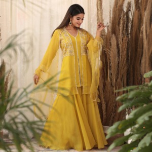 Layered Short kurta with pitta zari emb & pearl work with flared bais pallzo and cape style organza dupatta with organza ruffles