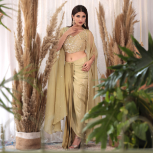 Crepe blouse with a draped skirt in shimmer satin fabric with an organza cape.